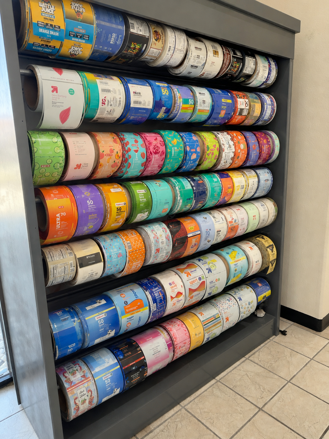 Printed packaging sample rolls displayed at Lone Star Labels & Packaging