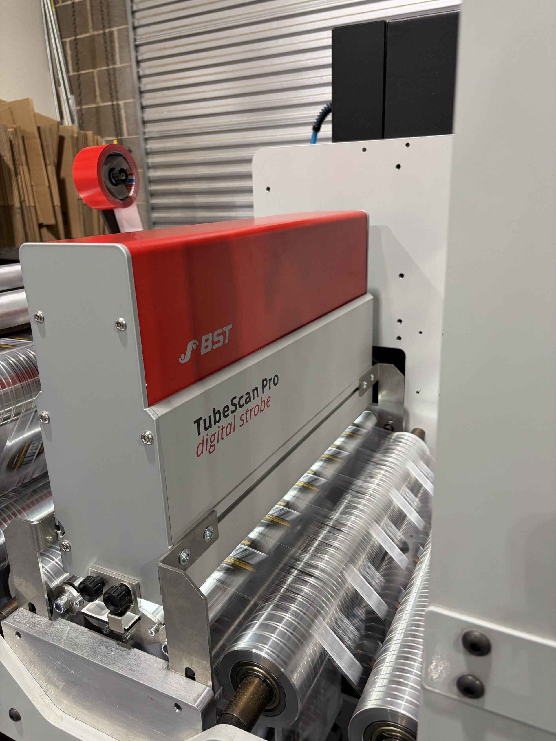 BST TubeScan inspection equipment operating on printed labels at Lone Star Labels and Packaging